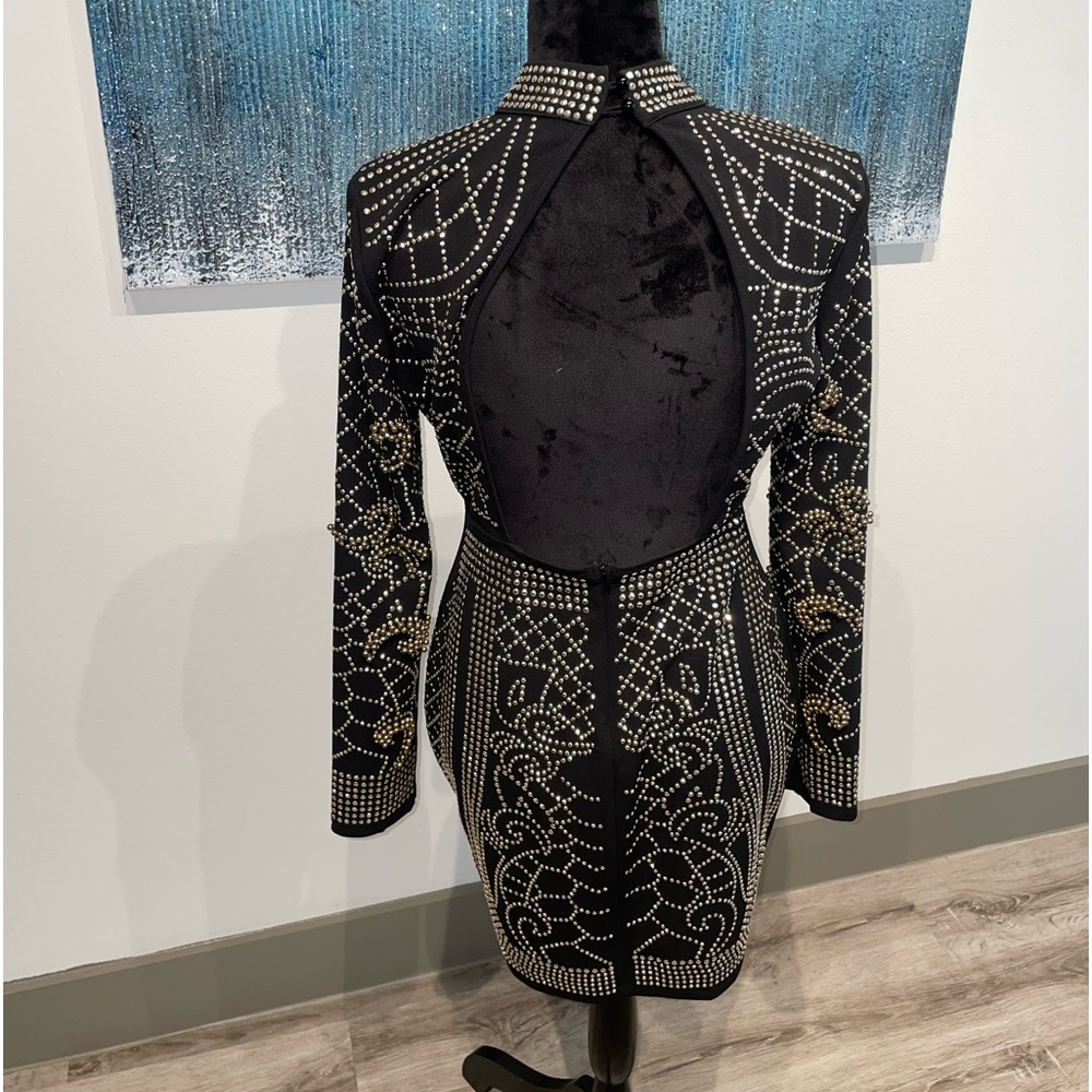 Fashion Nova black dress with silver and gold beaded details.